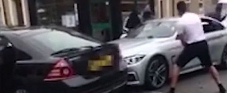 Thugs smash BMW with baseball bats in "targeted attack" in Lancashire, UK