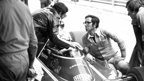 Mauro Forghieri next to Clay Regazzoni's #11 Ferrari 312 T 