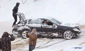 Meanwhile in Romania: Cunning Driver Gets Out of Snow Using Human Magic Body Control