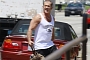 Mel Gibson Flexes His Muscles Next to His BMW 3 Series Convertible