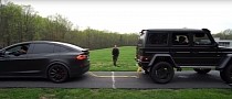 Mercedes-Benz G550 4x4 Squared vs. Tesla Model X Tug of War Is Closely Fought