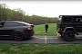 Mercedes-Benz G550 4x4 Squared vs. Tesla Model X Tug of War Is Closely Fought