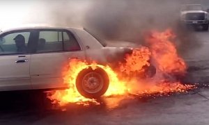 Mercury Grand Marquis Catches Fire During Burnout Contest, Driver Keeps Going
