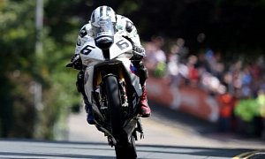 Michael Dunlop Brings BMW Historic Win in the Superbike Race at the 2014 IOM TT