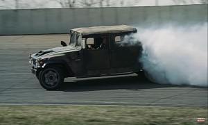 Mil-Spec Hummer H1 Appropriately Uses Banked Figure-8 Bus Racetrack for Drifting