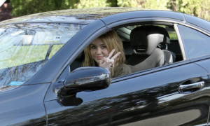 Miley Cyrus Loves Peace and Her SL550 Benz