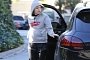 Miley Cyrus Takes Her Dog for a Walk...With Her Porsche Cayenne GTS