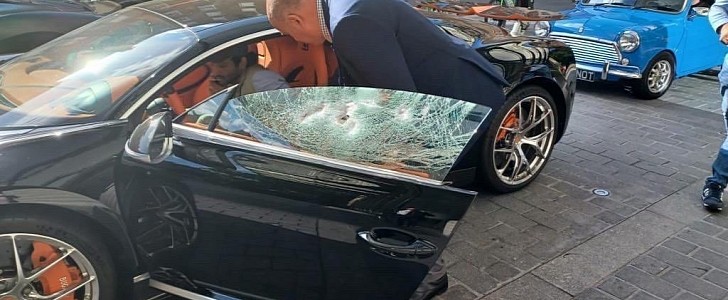 Millionaire's Bugatti Chiron smashed with a hammer by moped thieves in London