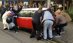 MINI Driver Blocks Tram, Angry Passengers Push It Out of the Way