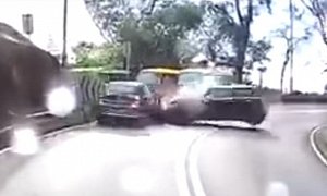 MINI Driver Ignores Double Line, Smashes into BMW 1 Series in Blind Corner
