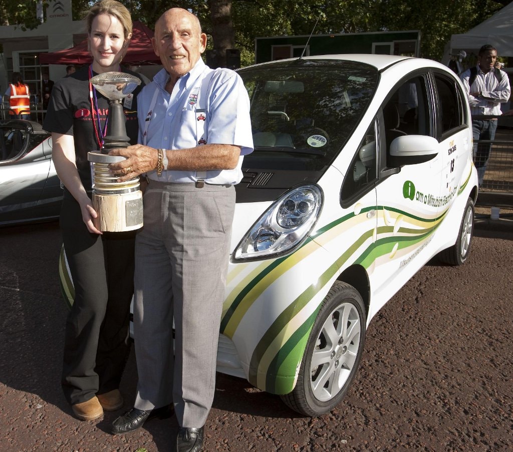 Sir Stirling Moss next to the i-MiEV