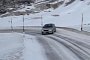 Mitsubishi Lancer Evo Drifting on Snowy Mountain Road Doesn't Even Try