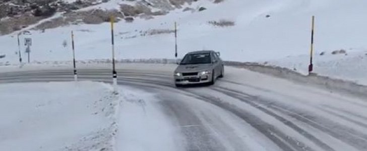 Mitsubishi Lancer Evo Drifting on Snowy Mountain Road