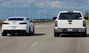 Modded Chevrolet Camaro SS Races Silverado 1500 Drag Truck With Dramatic Results