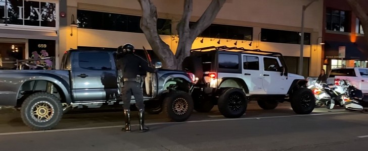 Toyota truck rams into Jeep Wrangler, which knocks over cop bikes