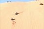 Silly Drivers Manage to Crash Two Small Cars on a Huge Sand Dune