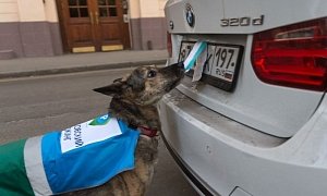 Moscow Police Dogs Fight Bad Parking by Uncovering Plates