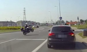 Motorcycle Cop Wheelies into Action Like a Boss