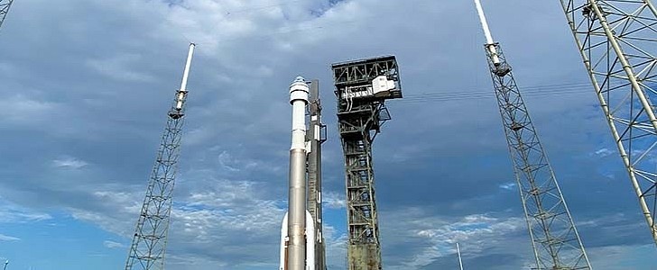 Boeing's Starliner capsule and its United Launch Alliance Atlas V rocket roll out to their launch pad 