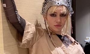 Musician Grimes Is Ready for Space Travel With Full Back “Alien Scar” Tattoo