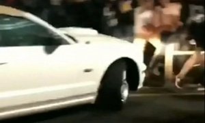 Mustang Doing Donuts Hits 15 People in K-Mart Parking Lot, Crowd Tears Car Apart