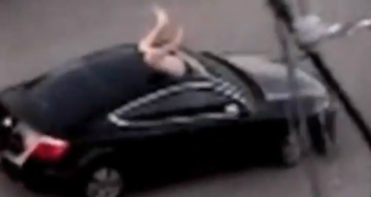 Naked Guy Jumps Through the Sunroof of a Moving Vehicle