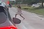 Naked Woman Causes a Scene in Traffic, During Road Rage Altercation