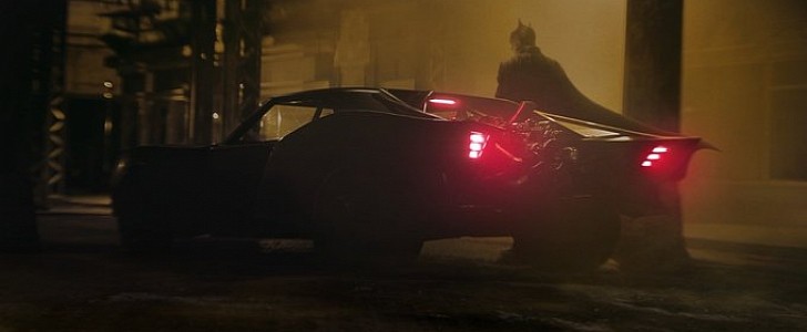 Batman and his new Batmobile he can't afford