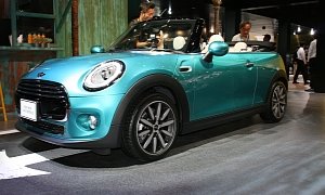 New MINI Convertible Debuts in Tokyo with Male Model by Its Side