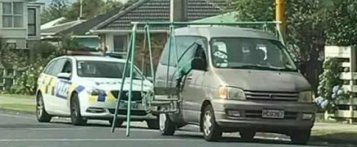 Full sized swing set transported on car in New Zealand