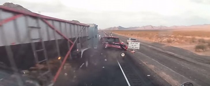Semi-truck smashes into parked cars after driver falls asleep at the wheel