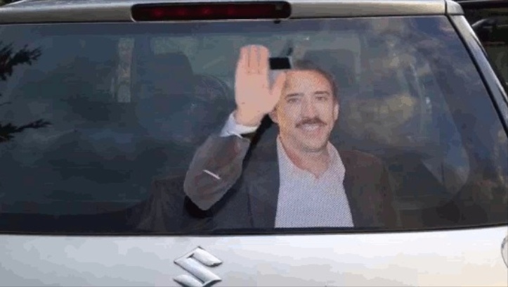 Nicolas Cage Cutout Car's Back Window Makes You Feel Special