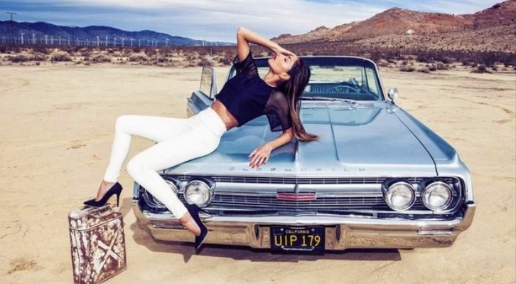 Nicole Scherzinger Posing with Oldsmobile 98