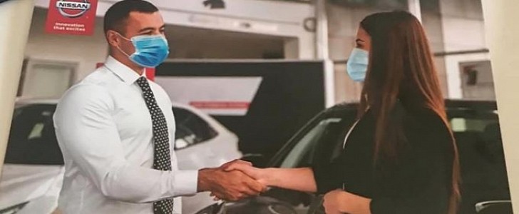 Flier for Nissan dealership in Canada raises eyebrows over touching of hands
