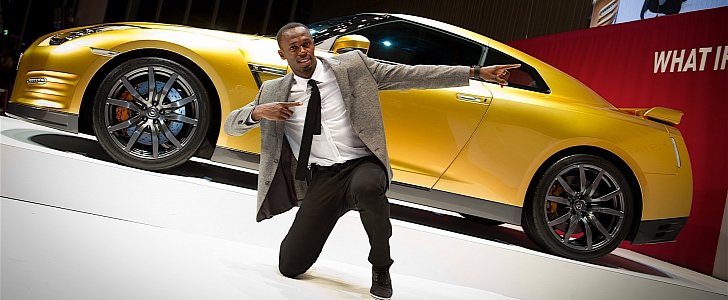 Usain Bolt and his golden Nissan GT-R