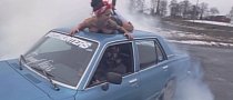 Norwegian Drifter Does Massive Burnout with Girl on Roof