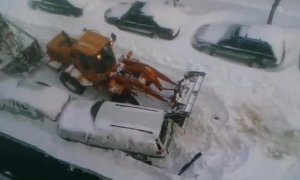 NY City Workers Clear Snow, Trash Ford Explorer