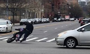 NYPD Cop Pops Wheelie on Confiscated Dirt Bike, Crashes it Into Cars