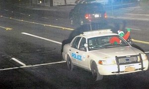 Officer Grinch Runs a Red Light, Gets His Picture Taken