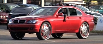 Old BMW 7-Series on 28-Inch Floating Rims