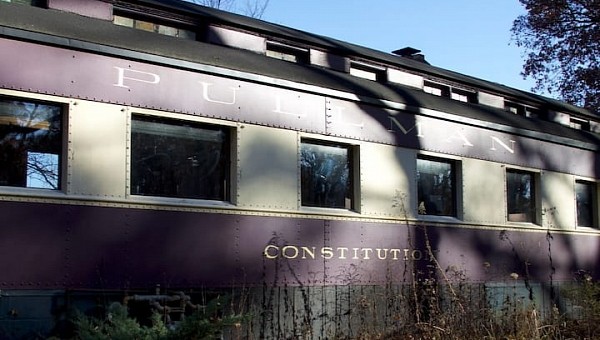 The Constitution is an impressive historic train from 1906, turned into a tiny home