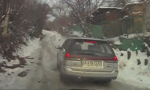 Old Subaru Legacy Loses Traction on Icy Uphill Road - Nearly Crashes