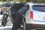 Orlando Bloom Attacks Paparazzi in a Cadillac SRX