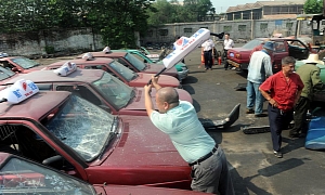Over 150 Illegal Taxis Get the Axe in China - Literally