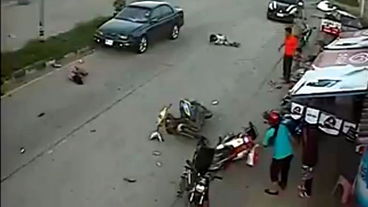 Painfully Reckless Scooter Rider Head-On Crash