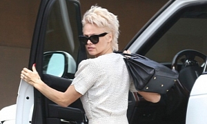 Pamela Anderson Drives Barefoot in a Range Rover