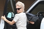 Pamela Anderson Drives Barefoot in a Range Rover