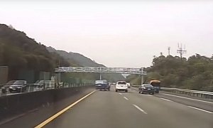 Panicked Driver Hogging Pass Lane On Highway Crashes Like in the Movies