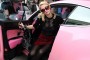 Paris Hilton Shows Off in Her Pink Bentley