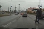 Pedestrian Does Matrix-Style Dodge Out of the Way of Moving Car